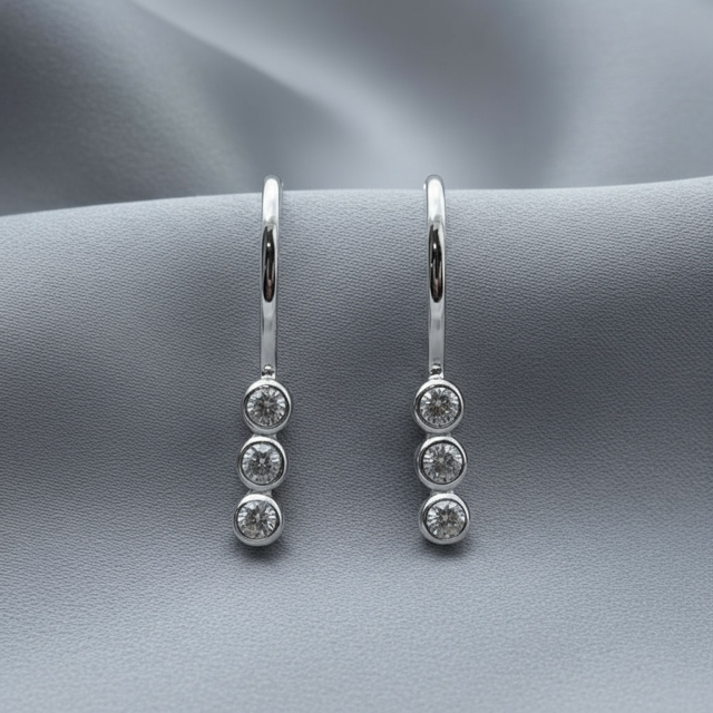 Elara Sterling Silver Triple CZ Drop Earrings