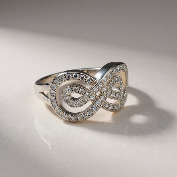 Crystal set infinity ring