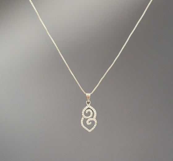 Crystal scroll pendant